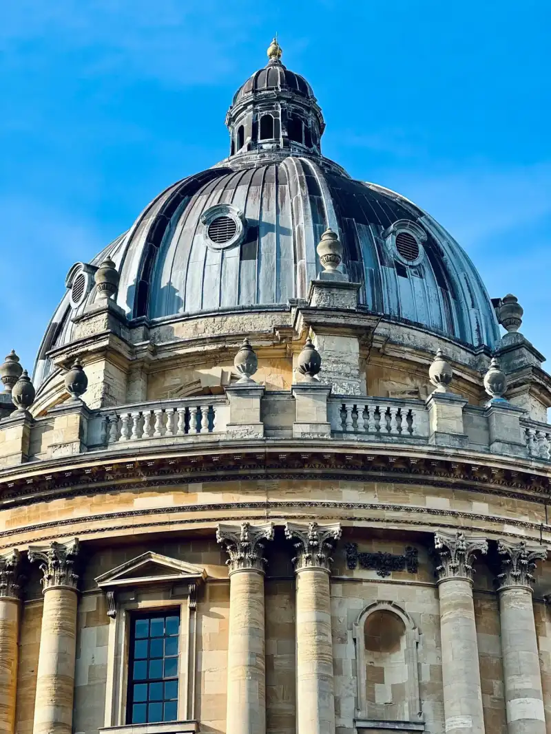 The Radcliffe Camera’s dome against a blue sky